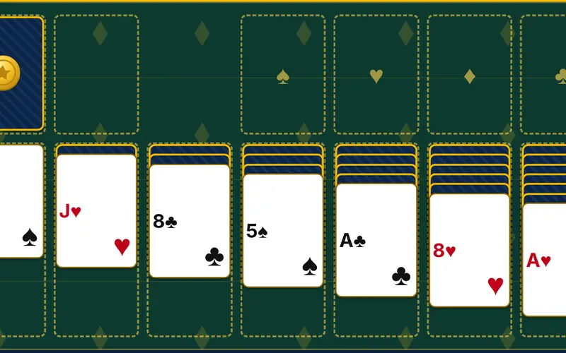 Klondike Solitaire gameplay: a dealt tableau of seven card columns on green felt